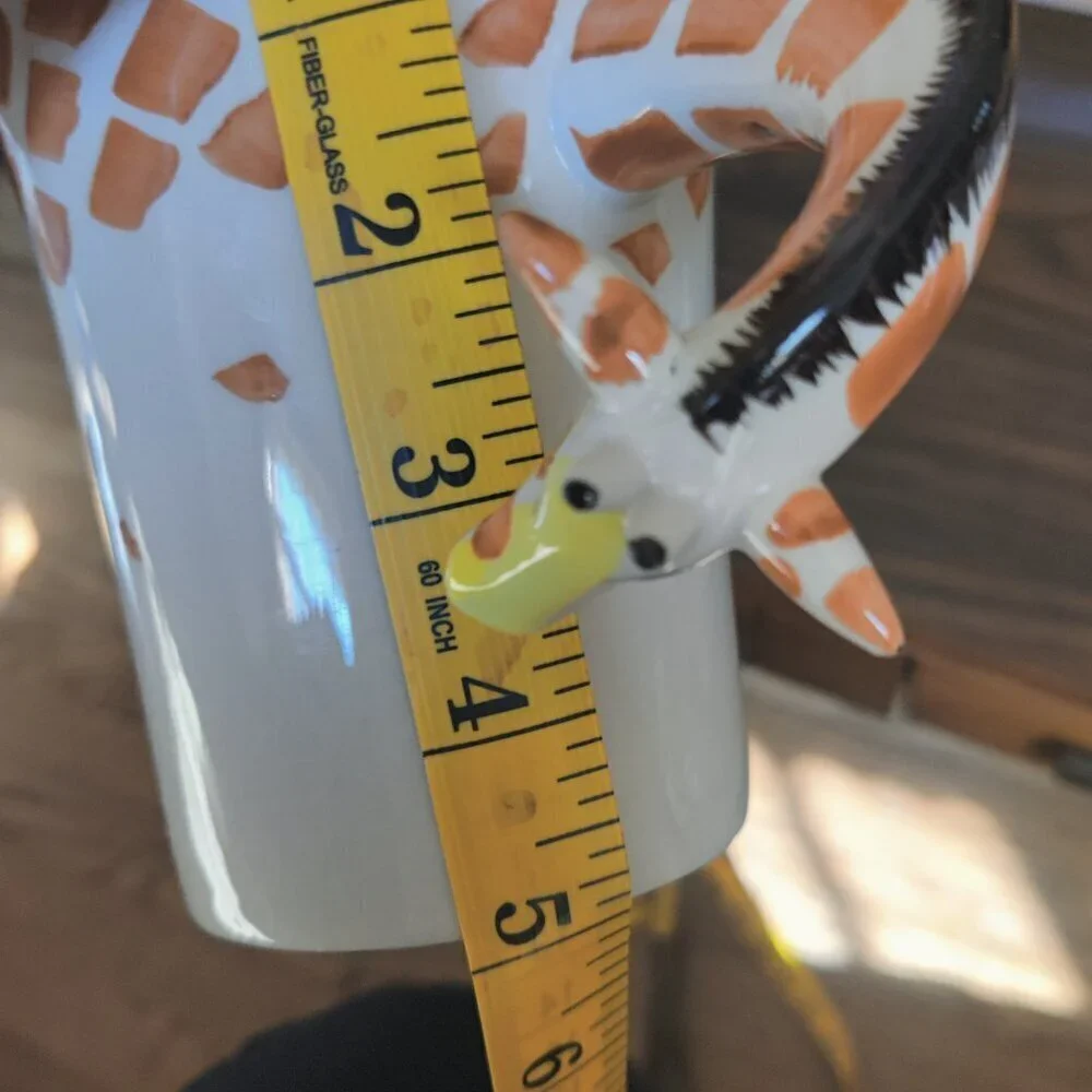 Pier One Giraffe Coffee Mug (2 avail) A 3D giraffe whose neck is a coffee handle